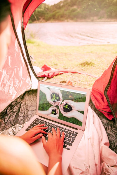 Free Laptop Mockup With Camping In Nature Concept Psd