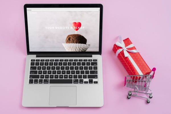 Free Laptop Mockup With Valentines Day Elements Psd