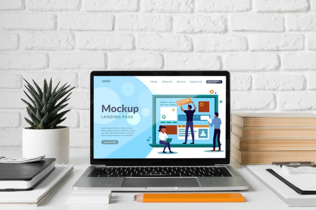 Free Laptop On Workplace Psd – DreamBundles