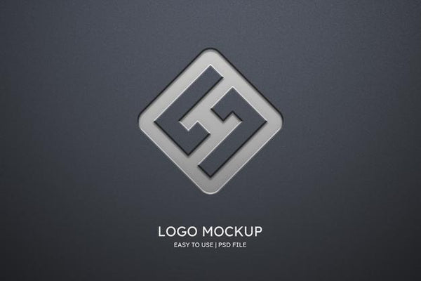 Free Logo Mockup On Grey Wall Psd