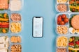 Free Lunch At Work With Mobile Beside Psd