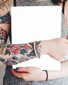 Free Magazine Mockup Held By A Tattooed Woman