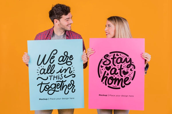 Free Man And Woman Holding A Sign Concept Mock-Up Psd