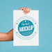 Free Man Holding Poster Mockup Psd