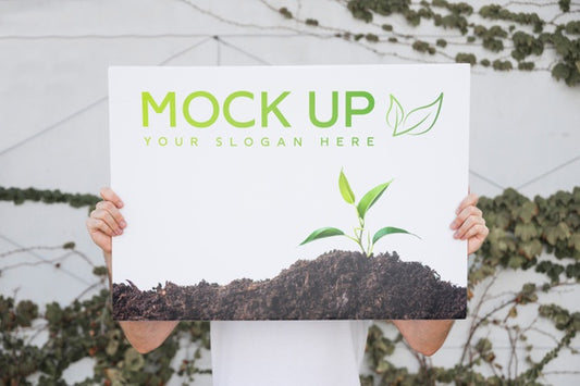 Free Man Presenting Poster Mockup Outdoors Psd