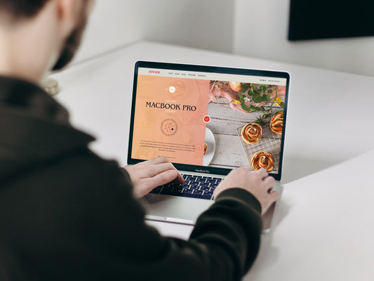 Free Man Using Macbook Pro Mockup