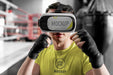 Free Man Using Virtual Reality Goggles At Boxing Training Psd