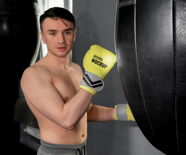 Free Man Wearing Boxing Gloves Mock-Up Psd