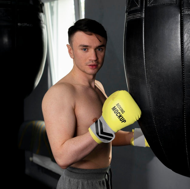 Free Man Wearing Boxing Gloves Mock-Up Psd