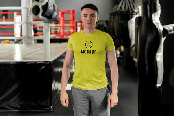 Free Man Wearing Boxing T-Shirt Mock-Up Psd