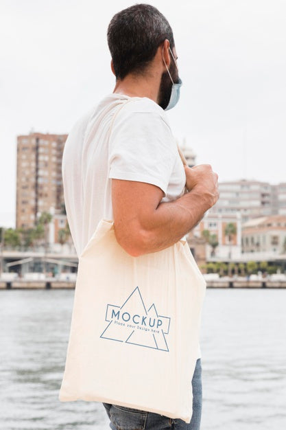 Free Man With Bag Mock-Up Concept Psd