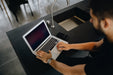 Free Man Working On A Laptop