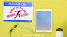 Free Marathon Mockup With Tablet Psd
