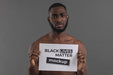 Free Medium Shot Black Man Holding Paper Piece Psd
