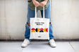 Free Men Holding Canvas Bag Mockup