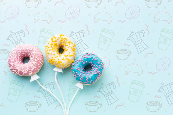 Free Mix Of Sprinkled Colorful Donuts Psd