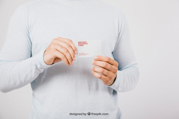 Free Mock Up Design With Man Holding Business Card Psd