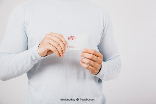 Free Mock Up Design With Man Holding Business Card Psd