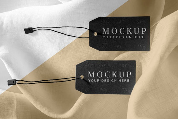 Free Mock-Up Of Clothing Black Labels On Soft Fabric Psd