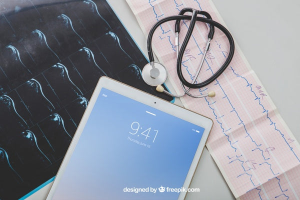 Free Mock Up With Medical Equipment And Tablet'S Screen Psd
