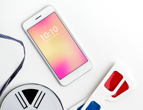 Free Mockup Of A Mobile Phone With Reel And 3D Glasses Psd