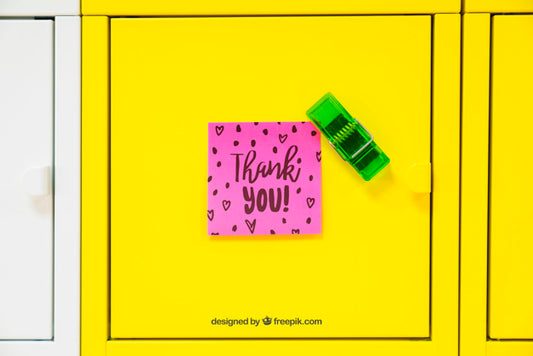 Free Mockup Of Adhesive Note On Yellow Background Psd