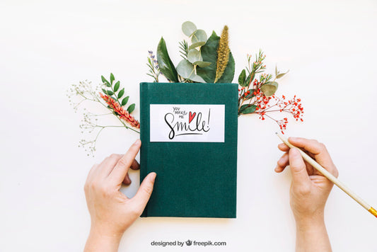 Free Mockup Of Book And Hands Psd