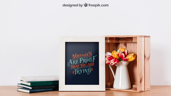 Free Mockup Of Frame And Books On Table Psd