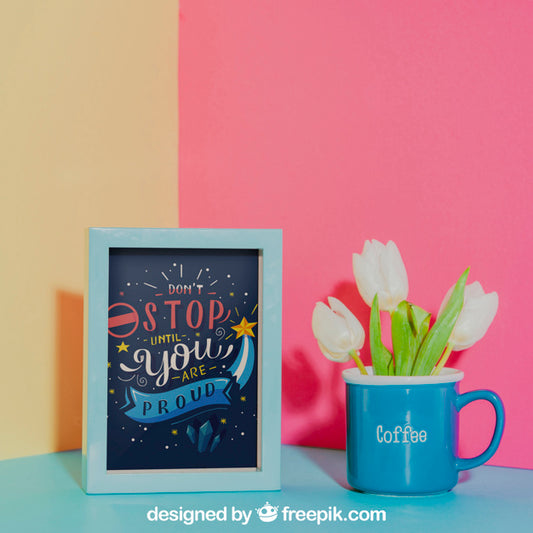 Free Mockup Of Frame Next To Blue Mug Psd