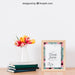 Free Mockup Of Frame Next To Plant On Books Psd