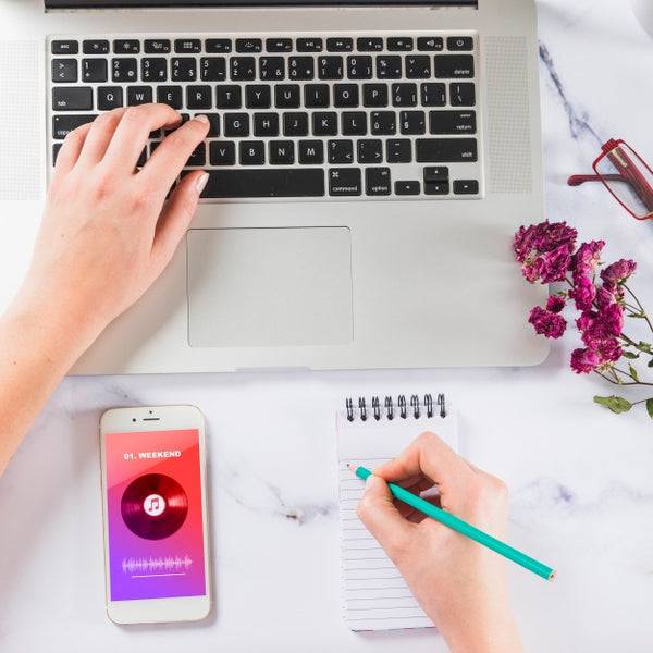 Free Mockup Of Hand Writing On Notepad With Laptop And Smartphone Psd