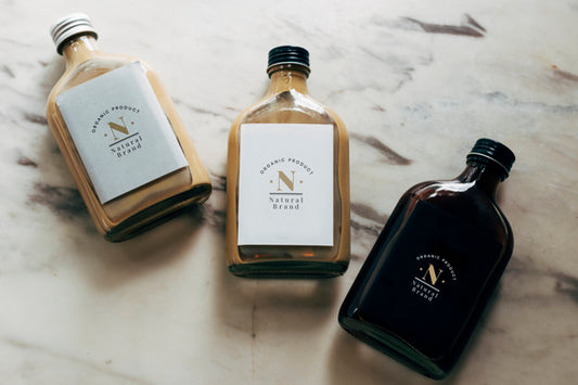 Free Mockup Of Liquid Bottle Labels Psd