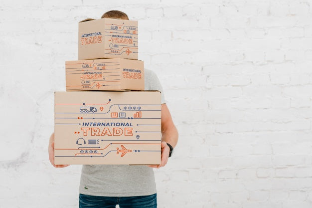 Free Mockup Of Man With Cardboard Boxes Psd