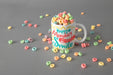 Free Mug Mockup With Colorful Cereals Psd