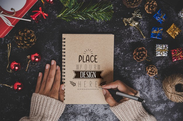 Free Notebook Mockup With Christmas Decoration Psd