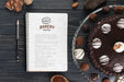 Free Notebook Mockup With Delicious Pastry Psd