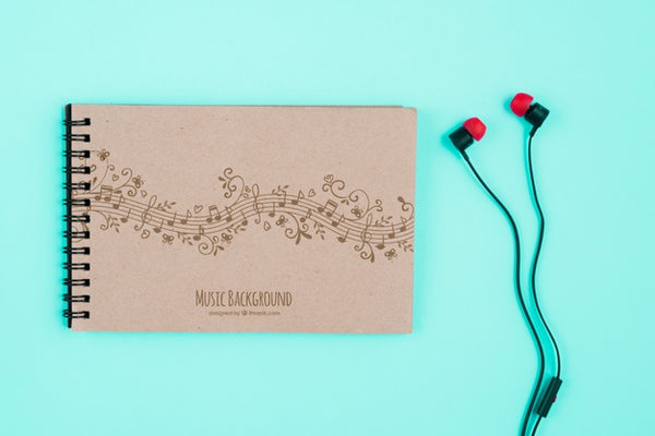 Free Notebook With Musical Notes Concept Psd