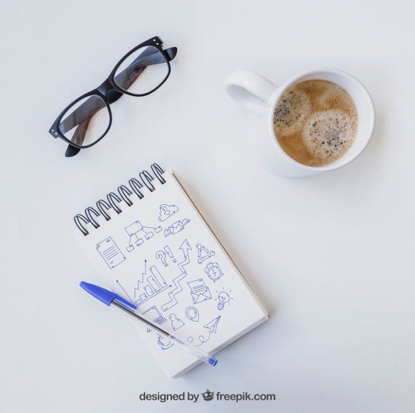 Free Notebook With Pen, Glasses And Coffee Psd