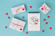 Free Notepad Mockup Next To Gift Boxes For Valentine Psd