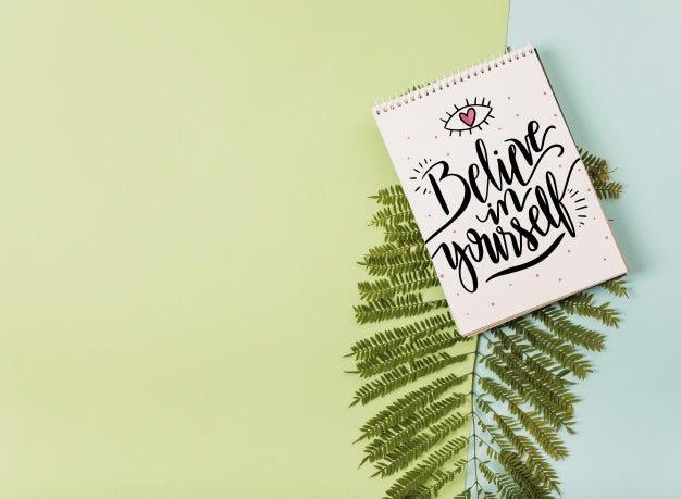 Free Notepad Mockup With Tropical Leaves Psd