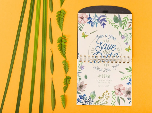 Free Notepad Mockup With Tropical Leaves Psd