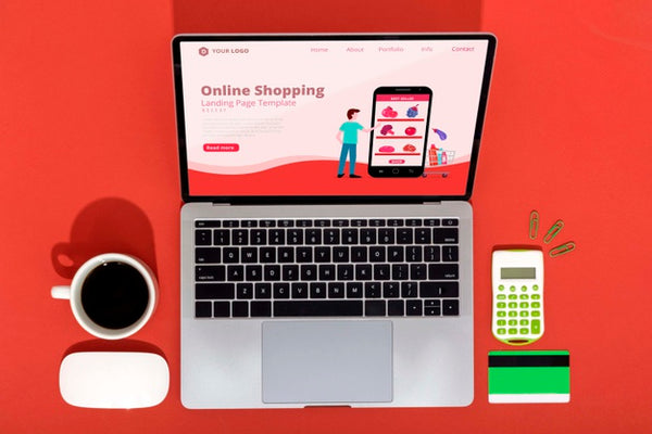 Free Online Shopping On Laptop With Coffee Beside Psd