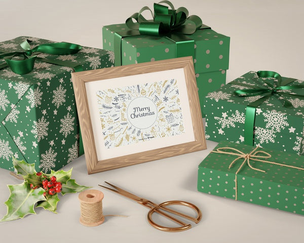 Free Painting On Table Beside Wrapped Gifts Psd
