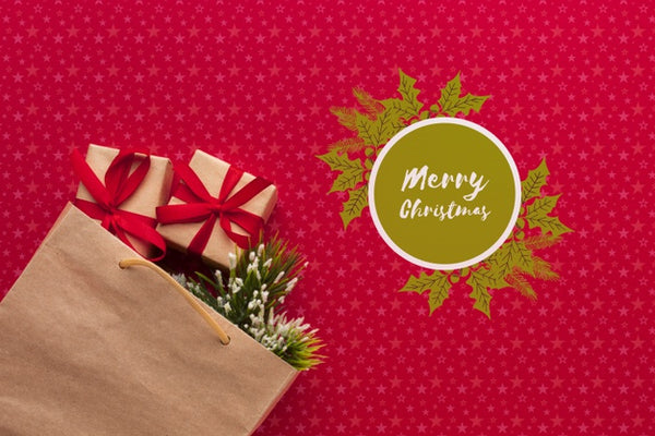 Free Paper Bag Full Of Gifts On Christmas Red Background Psd