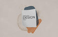 Free Paper Sheet Mockup Over Watercolor Stain Psd