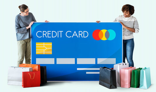 Free People Holding A Credit Card