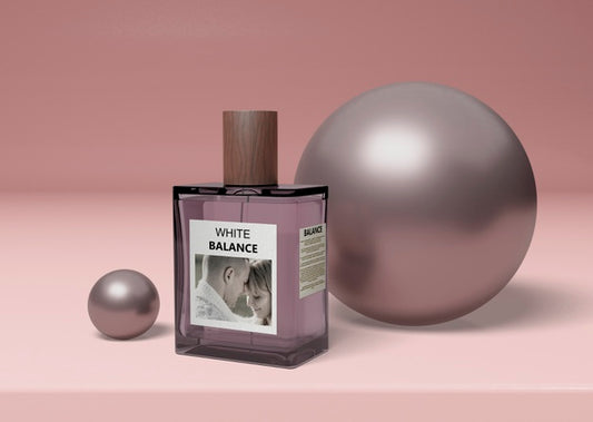 Free Perfume Bottle Beside Balls On Table Psd