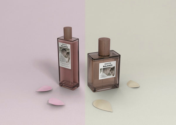 Free Perfume Bottles On Table With Petals Beside Psd