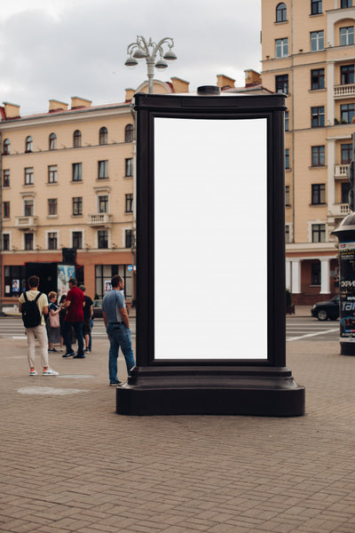 Free Photo Of A Large Billboard That Stands On The Street, Where Many People Walk Psd