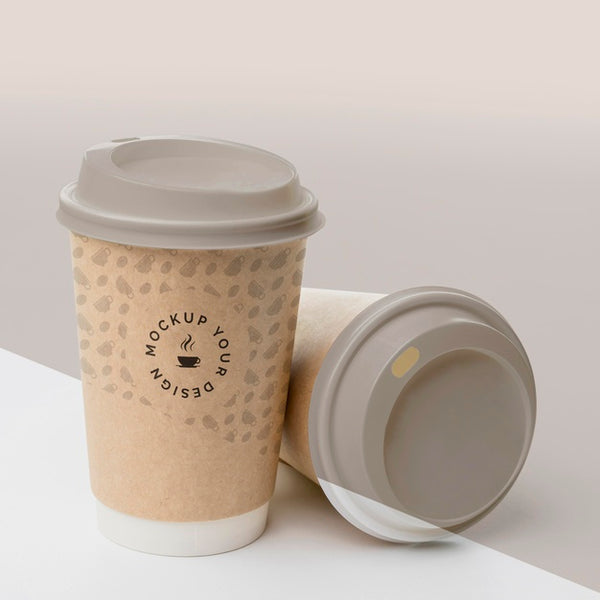 Free Plastic Cup With Coffee Mock Up On Table Psd